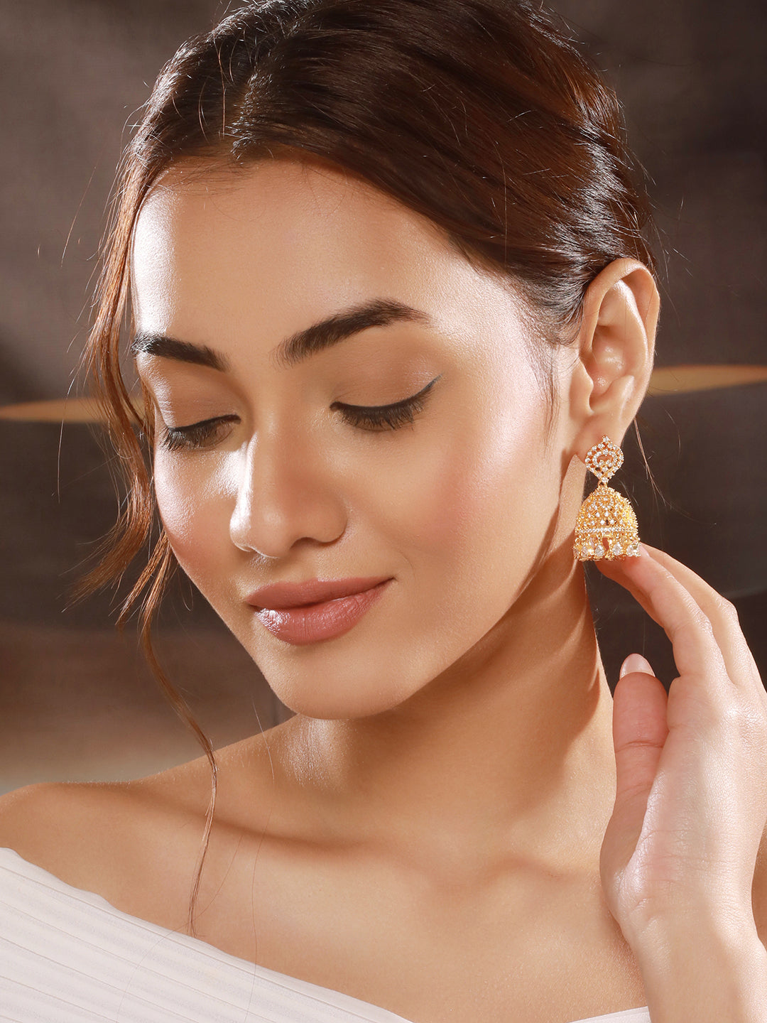 Gold Plated Cubic Zircon Studded Statement Jhumka Earrings